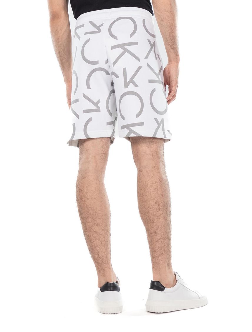 SHORT SLICED HALLMARK LOGO AOP KNIT