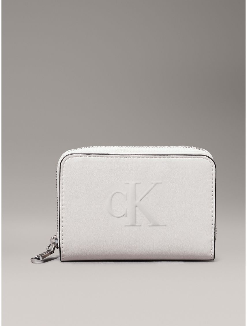 BILLETERA SCULPTED MED ZIP AROUND DEBOSS