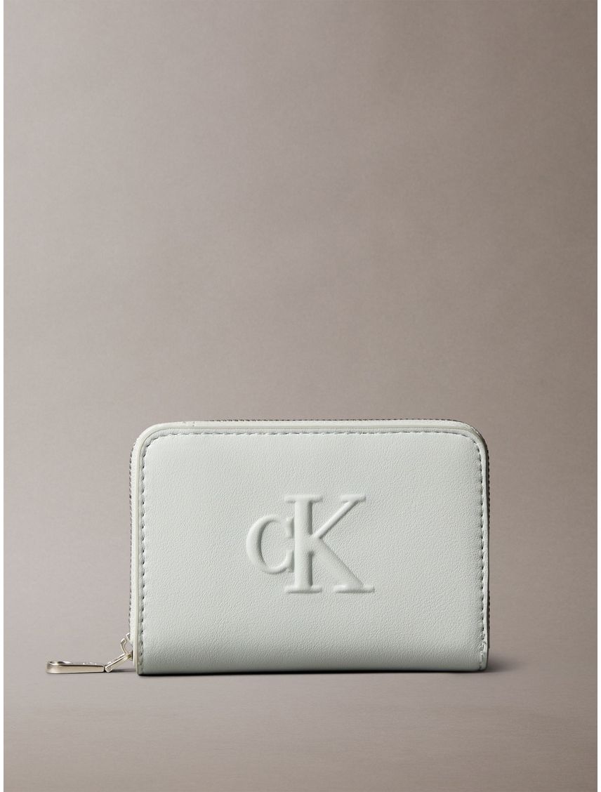 BILLETERA SCULPTED MED FLAP ZIP AROUND