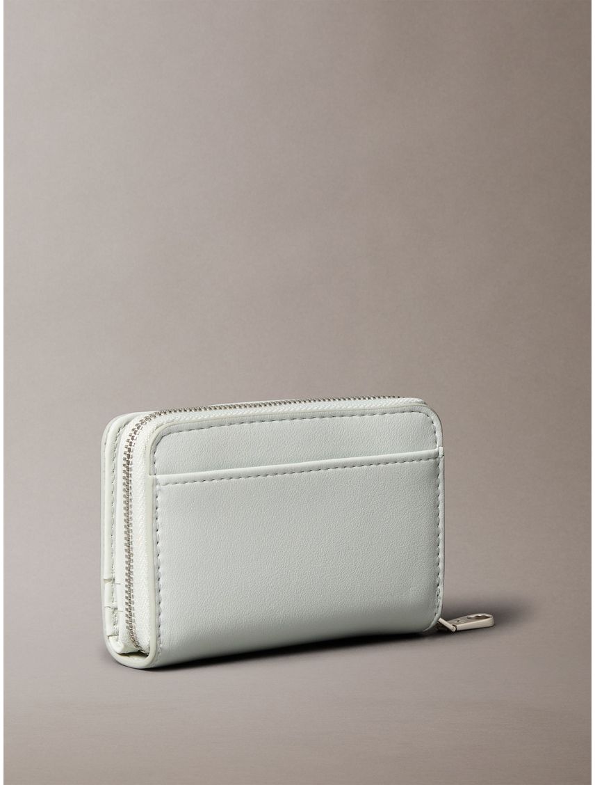BILLETERA SCULPTED MED FLAP ZIP AROUND