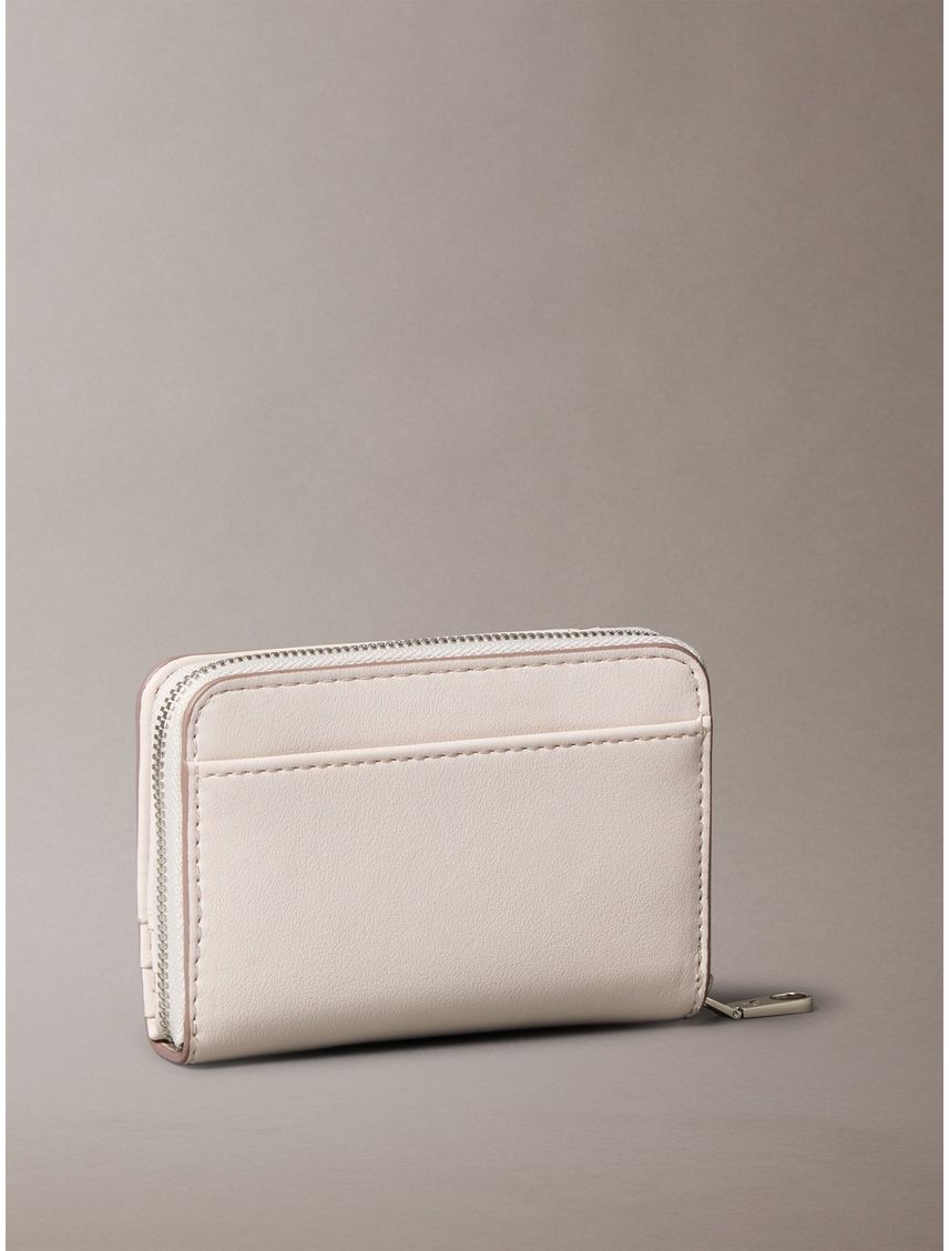 BILLETERA SCULPTED MED FLAP ZIP AROUND
